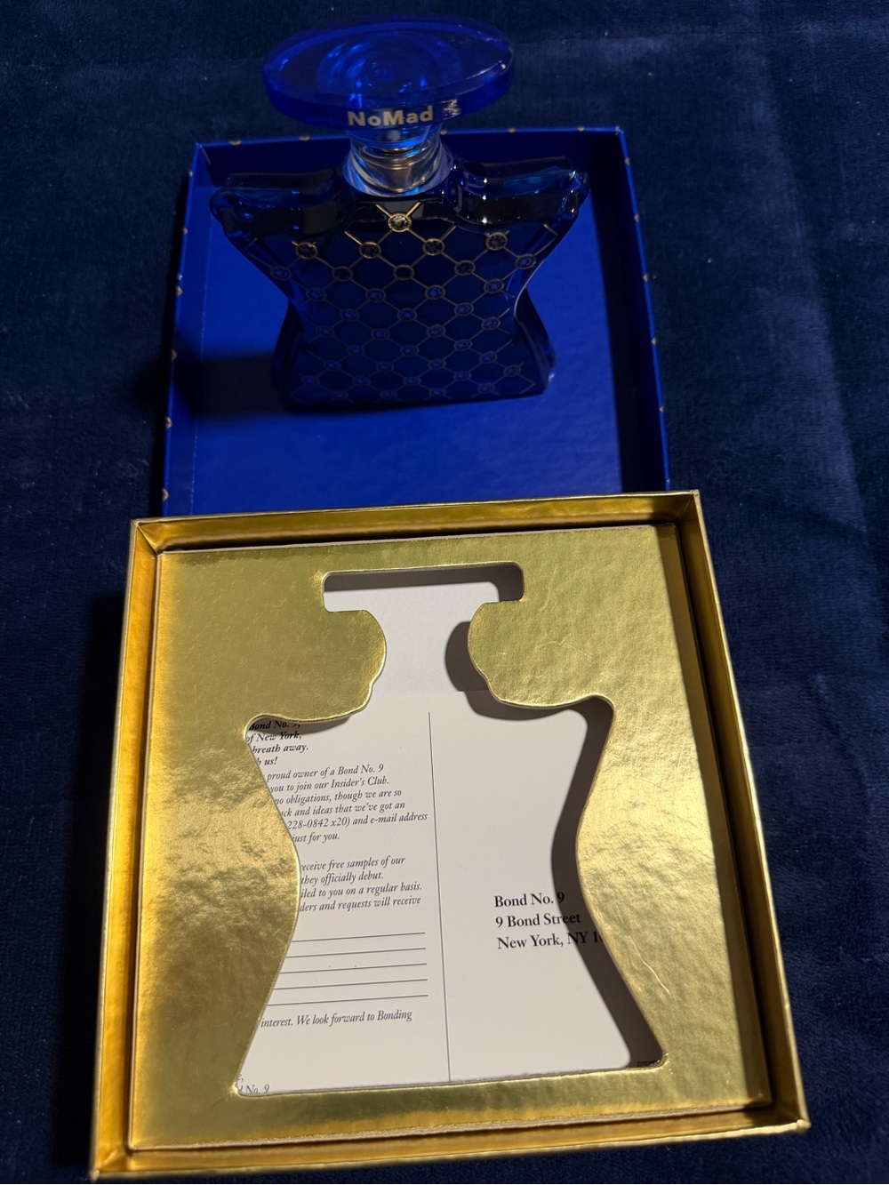 Nomad Blue Star-Shaped Decorative Bottle with Gold Lattice